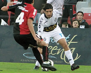 AL MENOS, COMPROMISO